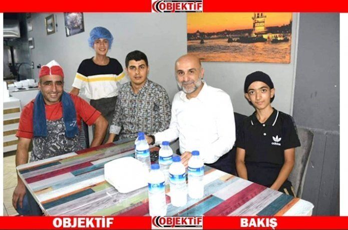 Özdemir esnaf ziyaretindeydi