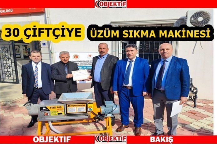 Çiftçilere üzüm sıkma makinesi