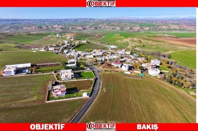 Köy yoluna beton asfalt
