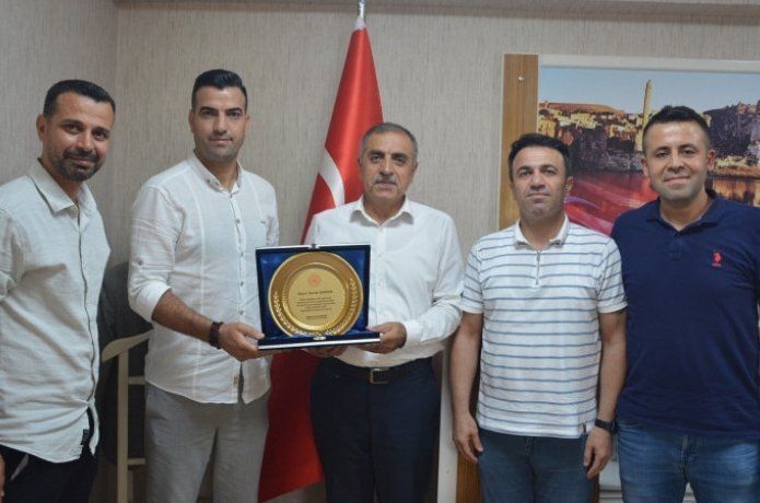 Özperk’ten Dursun’a teşekkür plaketi
