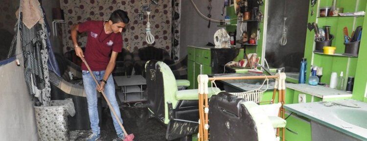 İş yeri yanan Suriyeli yardım istedi