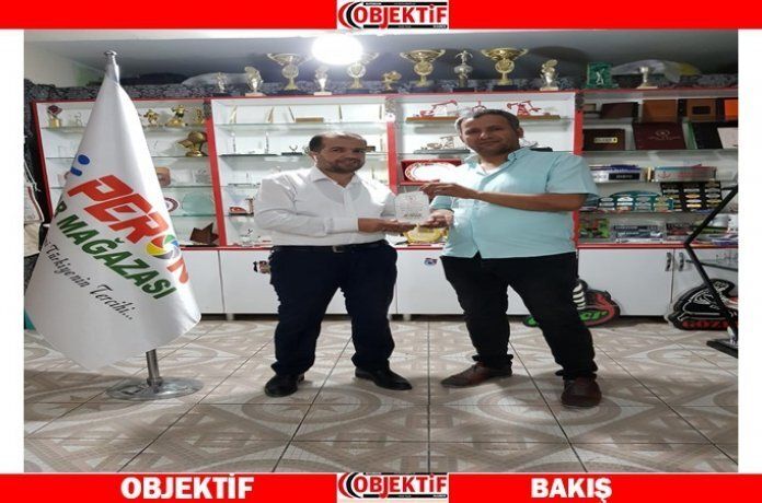 Çetin'den Özalp'a teşekkür plaketi