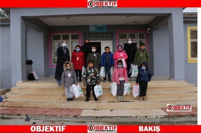 İhtiyaç sahibi öğrencilere bot ve mont yardımı yapıldı